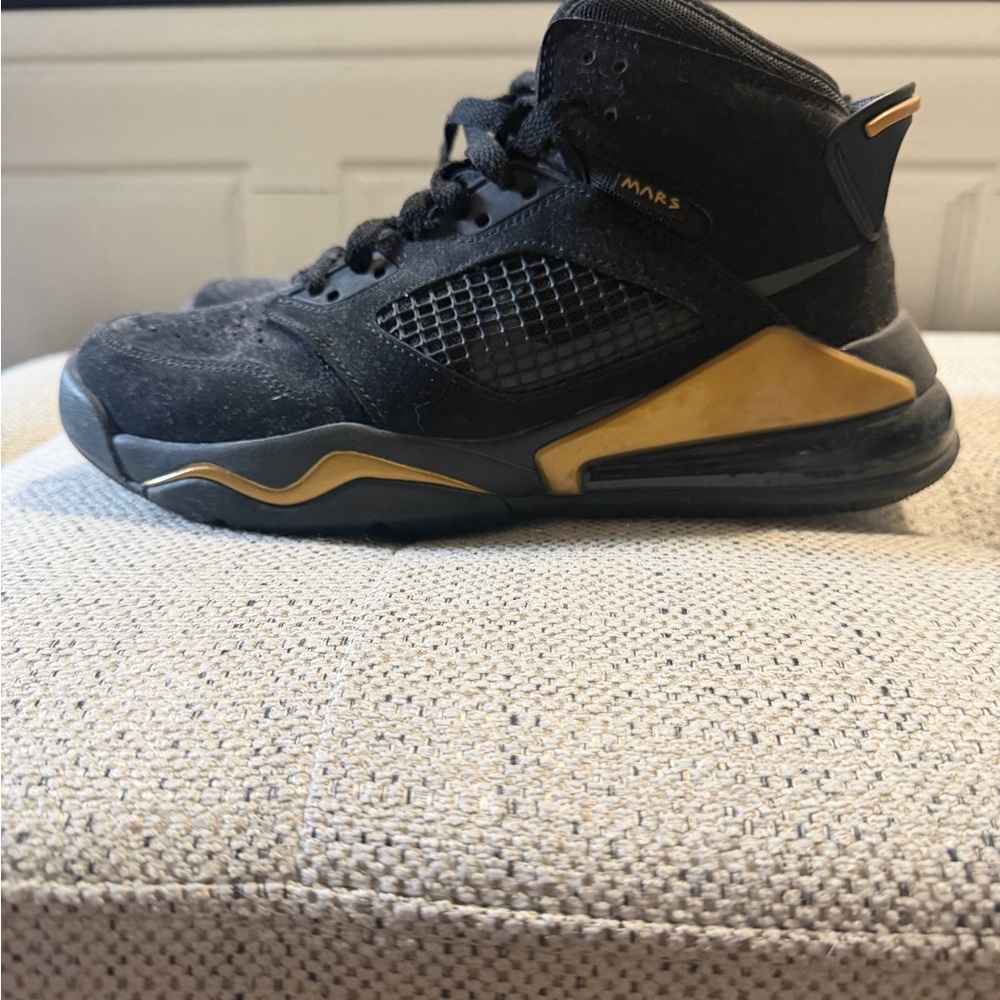 Jordan Black and Gold Sneakers